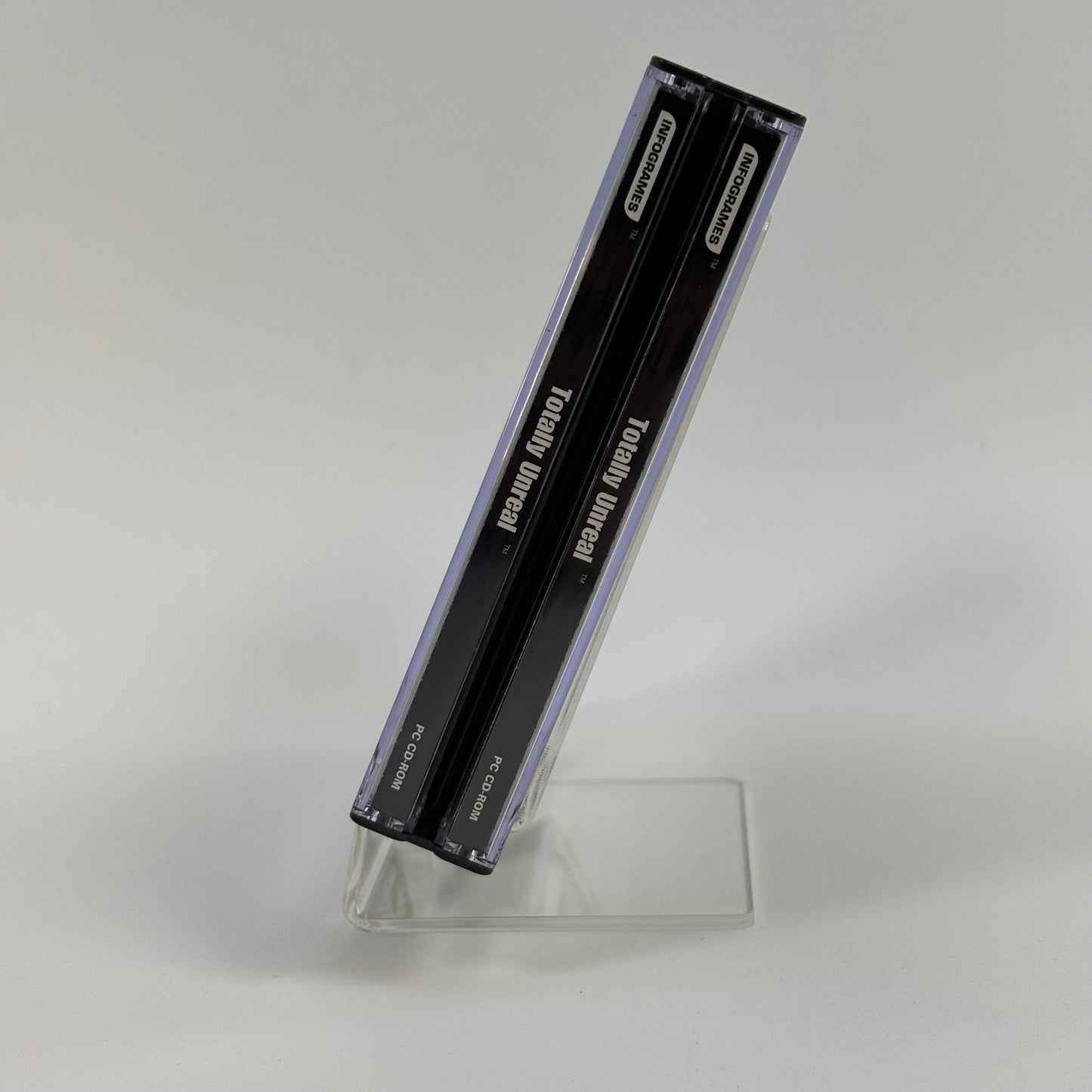 Totally Unreal (PC, 2001) and Quake III Arena (PC, 1999) w/Strategy Guide